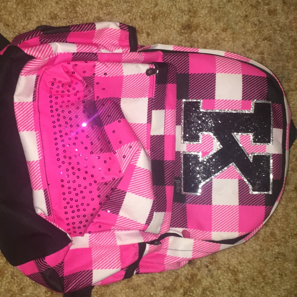 Black and pink plaid book bag